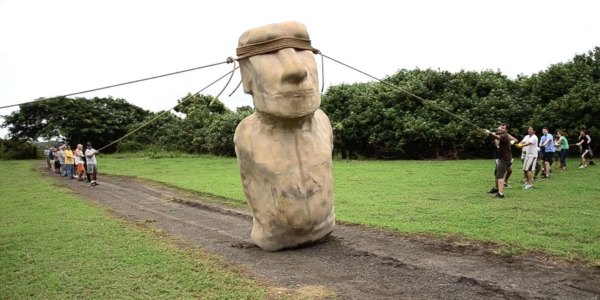 Demonstration of walking a moai statue using ropes on Rapa Nui.