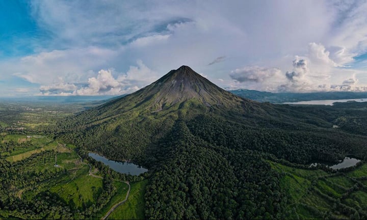 Arenal Volcano rising above the Costa Rican rainforest
