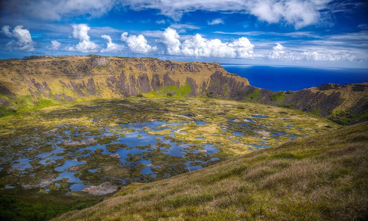 The volcanic coastline of Easter Island in the Pacific Ocean