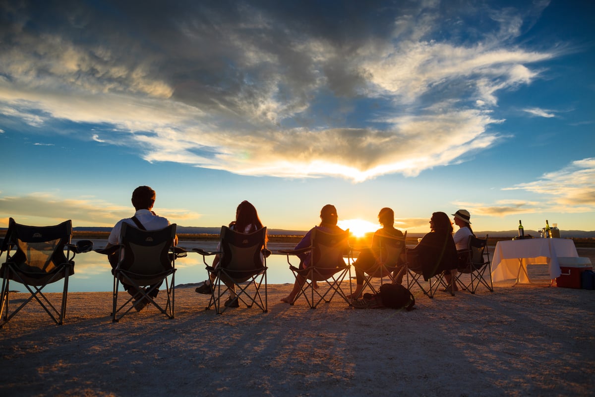 Family group sharing sunset in Chile's Atacama Desert