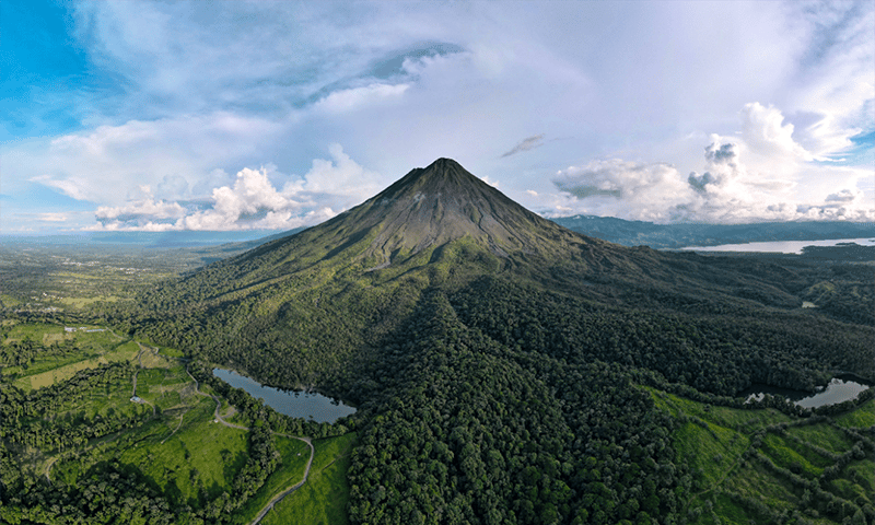 The Arenal Volcano rising above the Costa Rican rainforest