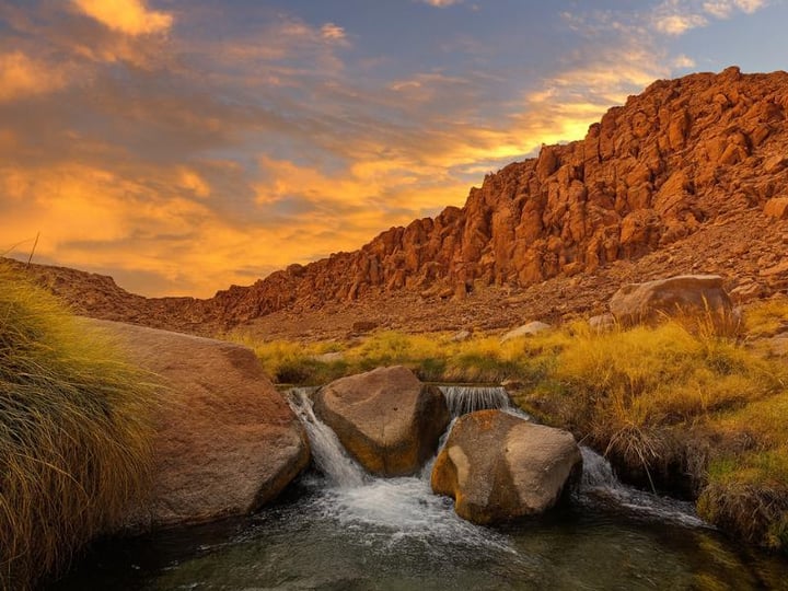 The pools of Puritama Hot Springs in their desert canyon