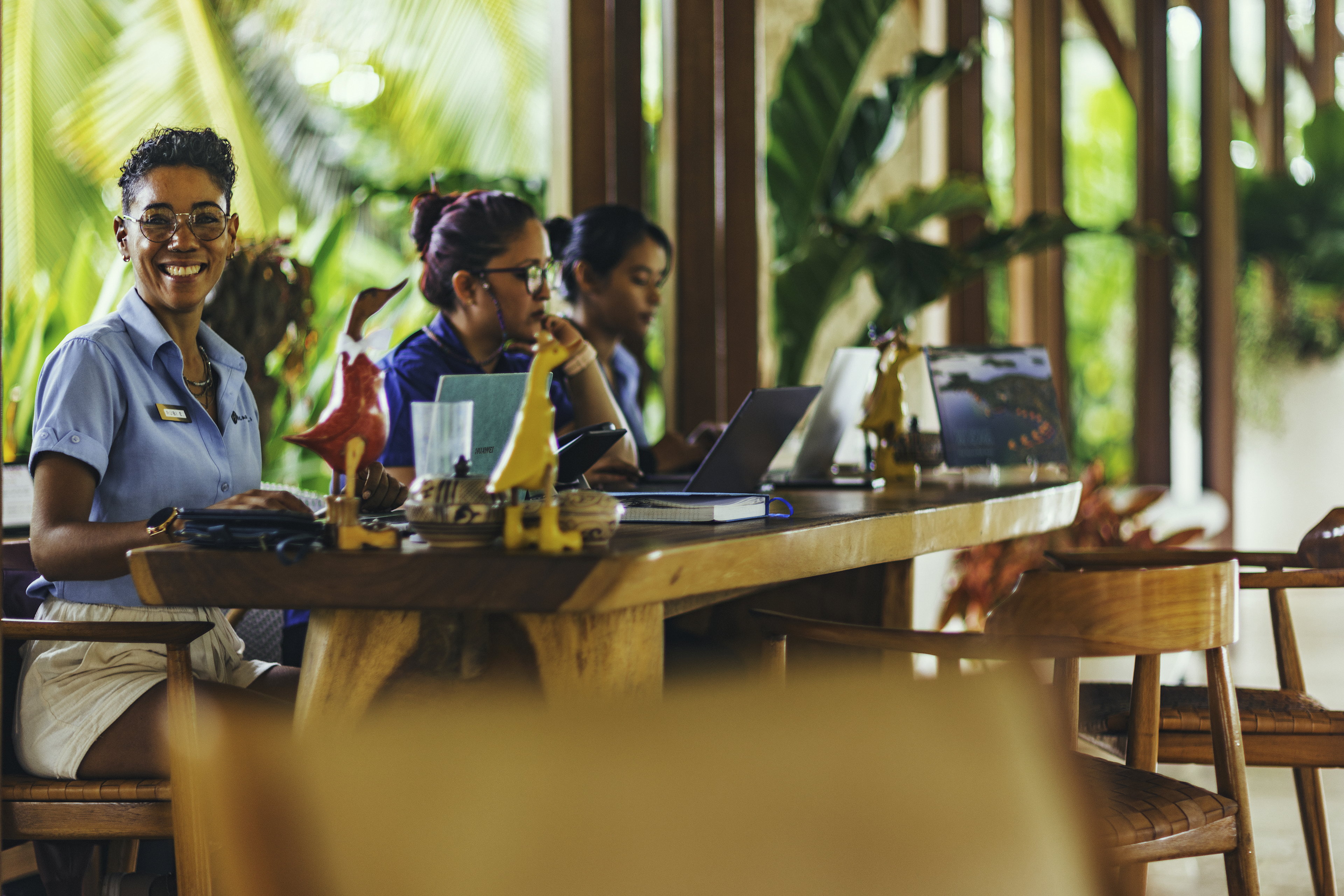 Nayara staff welcoming guests at the front desk of Nayara Bocas del Toro